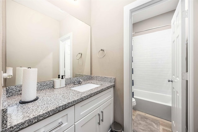 5023 Mallow St A/B, Unit A/B Houston, TX 77033 - bathroom featuring toilet, vanity, and tub / shower combination