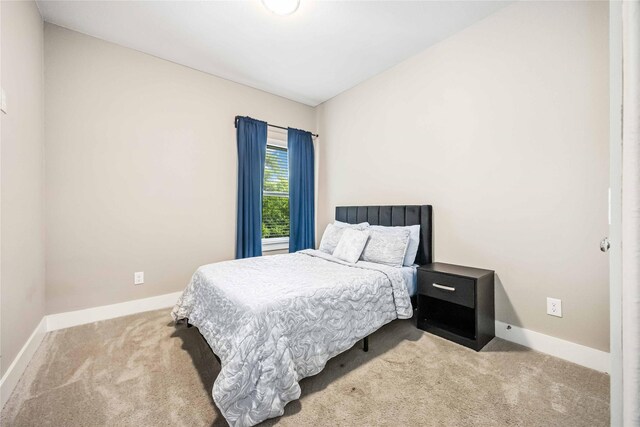 5023 Mallow St A/B, Unit A/B Houston, TX 77033 - carpeted bedroom featuring baseboards