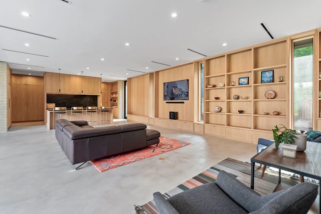 2021 Albans Rd, Houston, TX 77005 - living area with finished concrete floors and recessed lighting