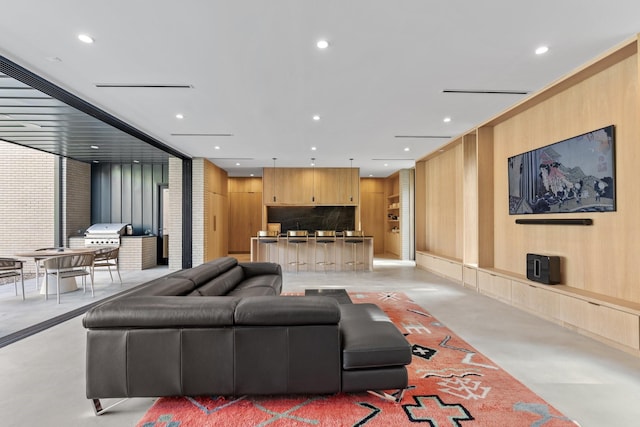 2021 Albans Rd, Houston, TX 77005 - living room with concrete flooring and recessed lighting