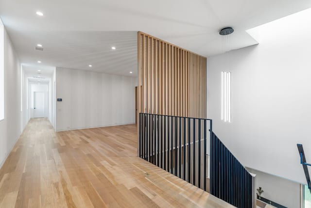 2021 Albans Rd, Houston, TX 77005 - corridor featuring light wood finished floors and recessed lighting