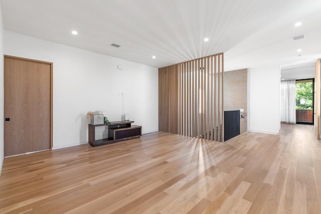 2021 Albans Rd, Houston, TX 77005 - living area with light wood-style flooring, recessed lighting, and a fireplace