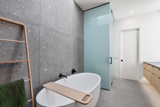 2021 Albans Rd, Houston, TX 77005 - bathroom featuring a freestanding tub and vanity