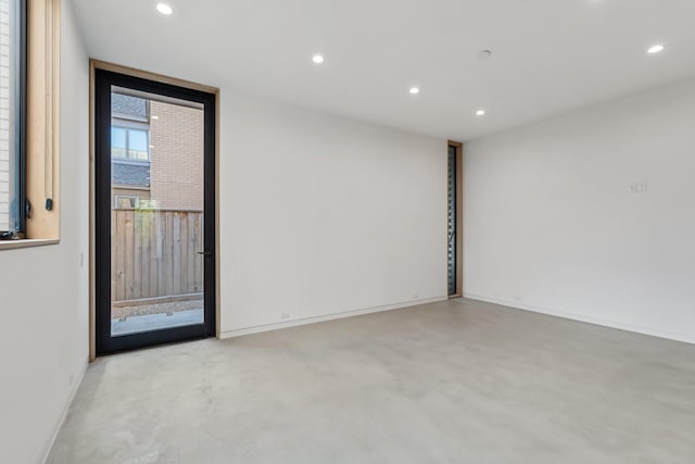 2021 Albans Rd, Houston, TX 77005 - unfurnished room featuring recessed lighting, baseboards, and finished concrete floors