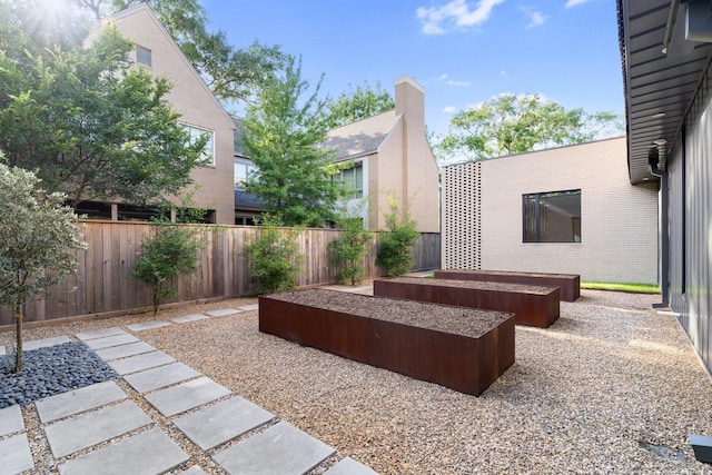 2021 Albans Rd, Houston, TX 77005 - view of patio with a fenced backyard and a garden