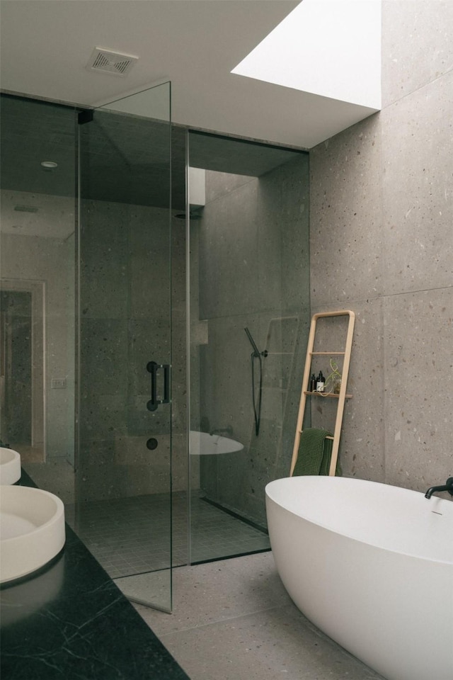 2021 Albans Rd, Houston, TX 77005 - full bathroom featuring a walk in shower and a freestanding bath