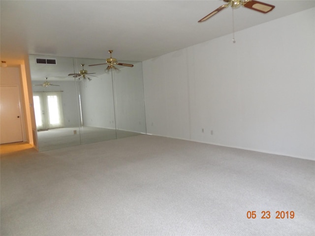 434 Wilcrest Dr Unit 434, Houston, TX 77042 - spare room with ceiling fan and carpet flooring