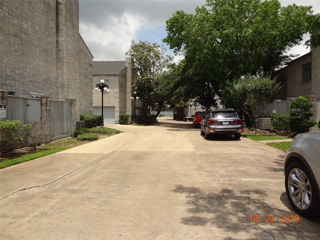 434 Wilcrest Dr Unit 434, Houston, TX 77042 - view of concrete road with street lights