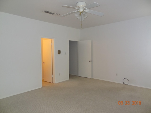 434 Wilcrest Dr Unit 434, Houston, TX 77042 - unfurnished room featuring light carpet, ceiling fan, and baseboards