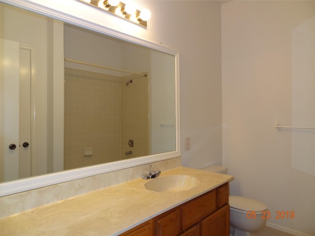 434 Wilcrest Dr Unit 434, Houston, TX 77042 - full bathroom featuring vanity, toilet, and a shower