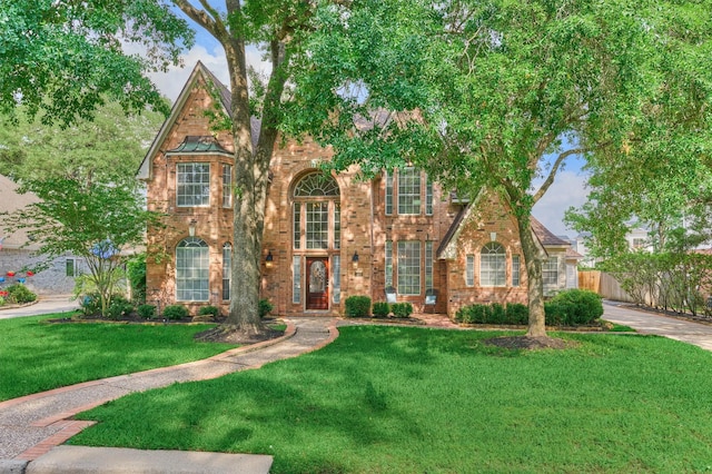 view of front of house featuring brick siding