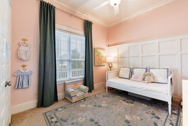 2176 Rope Maker Rd, Conroe, TX 77384 - living area with crown molding, carpet, a ceiling fan, and baseboards