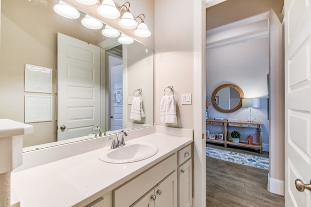 2176 Rope Maker Rd, Conroe, TX 77384 - bathroom with wood finished floors and vanity