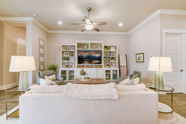 2176 Rope Maker Rd, Conroe, TX 77384 - living room with wood finished floors, a ceiling fan, ornamental molding, baseboards, and recessed lighting