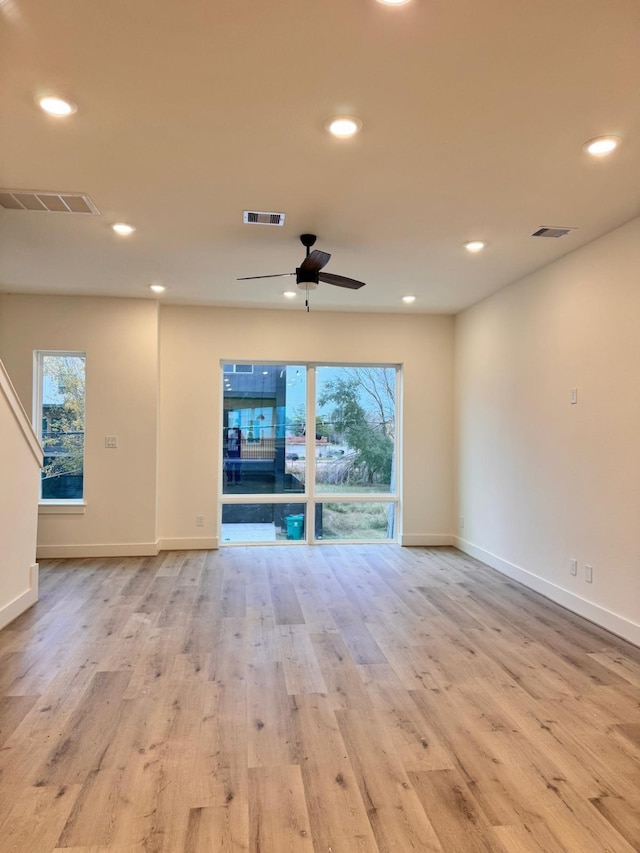 2708 Nagle St, Houston, TX 77004 - spare room with light wood finished floors, a ceiling fan, baseboards, and recessed lighting