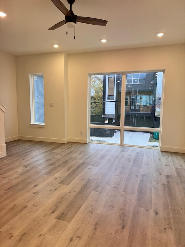 2708 Nagle St, Houston, TX 77004 - empty room with a ceiling fan, wood finished floors, baseboards, and recessed lighting