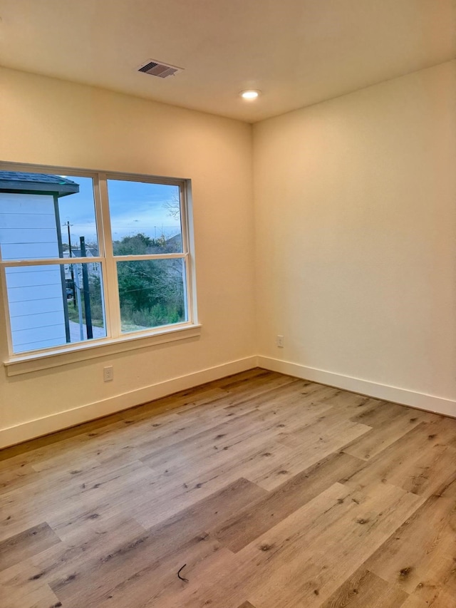 2708 Nagle St, Houston, TX 77004 - empty room with wood finished floors and recessed lighting