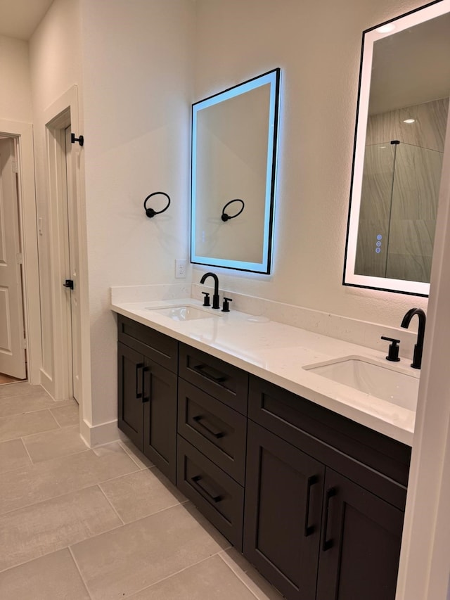 2708 Nagle St, Houston, TX 77004 - full bath featuring double vanity, tile patterned flooring, and tiled shower