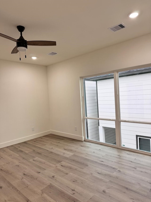 2708 Nagle St, Houston, TX 77004 - unfurnished room with baseboards, wood finished floors, ceiling fan, and recessed lighting