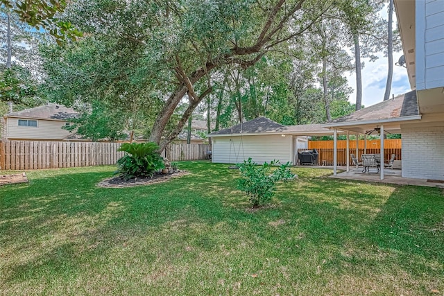 711 Lodgehill Ln, Houston, TX 77090 - view of yard with a patio area, an outbuilding, and ceiling fan