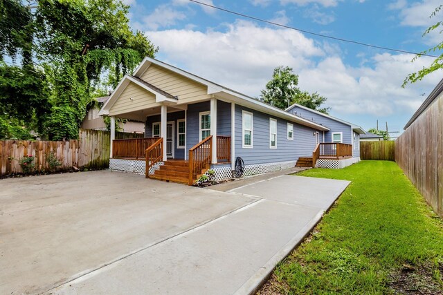 110 Amundsen St, Houston, TX 77009 - view of front of house featuring covered porch