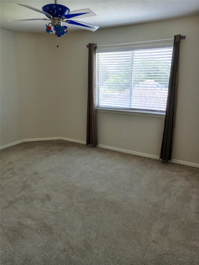 5014 Misty Park Ln, Sugar Land, TX 77479 - empty room featuring ceiling fan, carpet flooring, and baseboards