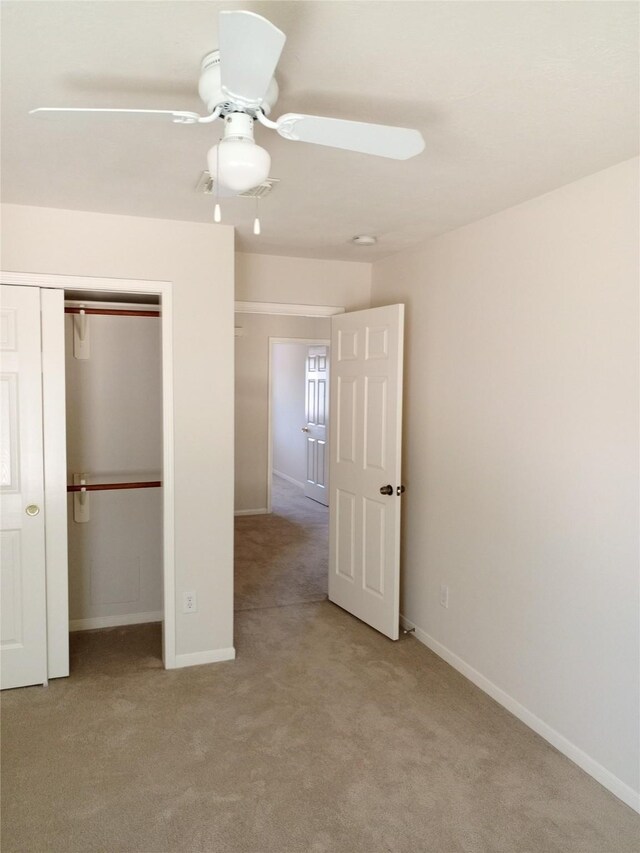 5014 Misty Park Ln, Sugar Land, TX 77479 - unfurnished bedroom featuring light carpet, baseboards, and a closet