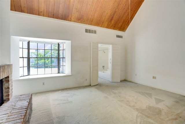 5380 Brownway St Unit D38, Houston, TX 77056 - unfurnished living room featuring wood ceiling, carpet flooring, a fireplace with raised hearth, and high vaulted ceiling