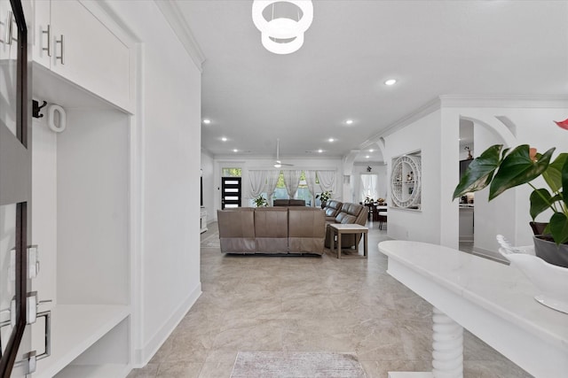 1314 Briar Cliff St, Conroe, TX 77385 - living room featuring recessed lighting, ornamental molding, and light marble finish floors