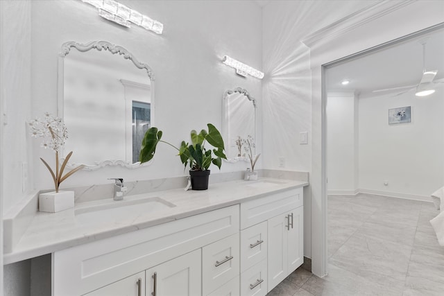 1314 Briar Cliff St, Conroe, TX 77385 - full bath with double vanity, marble look tiles, and baseboards