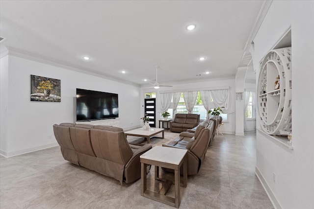 1314 Briar Cliff St, Conroe, TX 77385 - living room with ornamental molding, baseboards, a ceiling fan, and recessed lighting