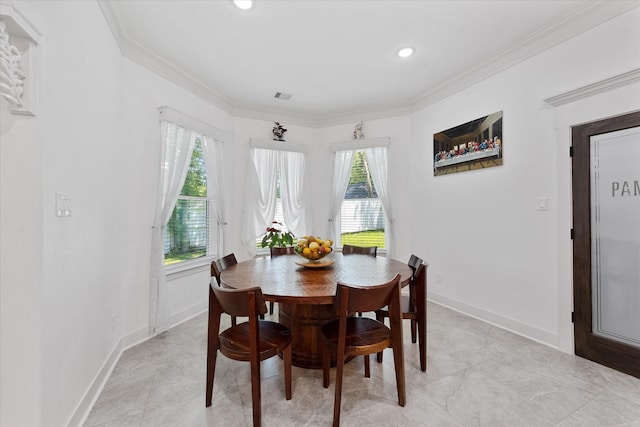 1314 Briar Cliff St, Conroe, TX 77385 - dining room featuring crown molding, baseboards, and recessed lighting