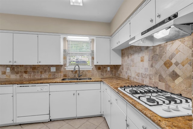 5839 Ettrick Dr, Houston, TX 77035 - kitchen with white appliances, a sink, under cabinet range hood, and white cabinetry