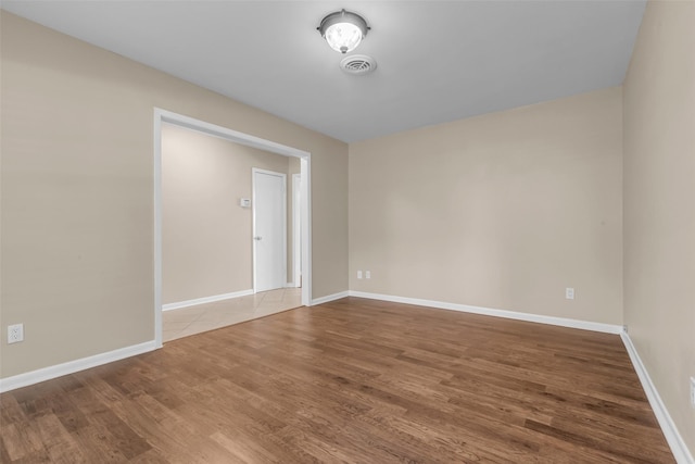 5839 Ettrick Dr, Houston, TX 77035 - spare room with wood finished floors and baseboards