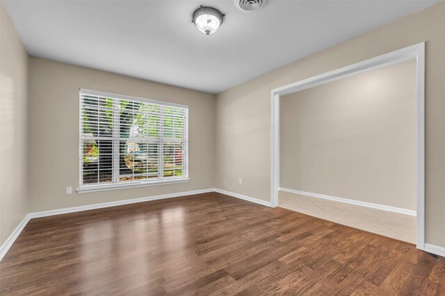 5839 Ettrick Dr, Houston, TX 77035 - empty room featuring wood finished floors and baseboards