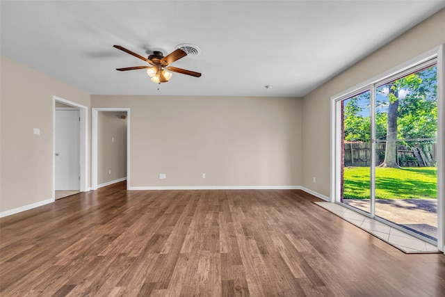 5839 Ettrick Dr, Houston, TX 77035 - unfurnished room featuring a ceiling fan, wood finished floors, and baseboards
