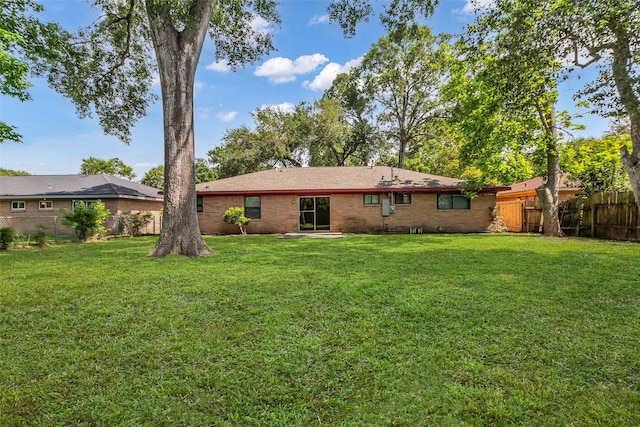 5839 Ettrick Dr, Houston, TX 77035 - rear view of house featuring brick siding