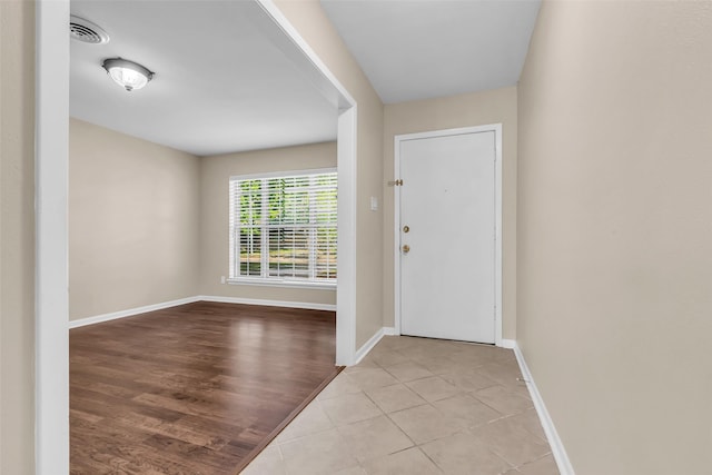 5839 Ettrick Dr, Houston, TX 77035 - foyer featuring baseboards and wood finished floors