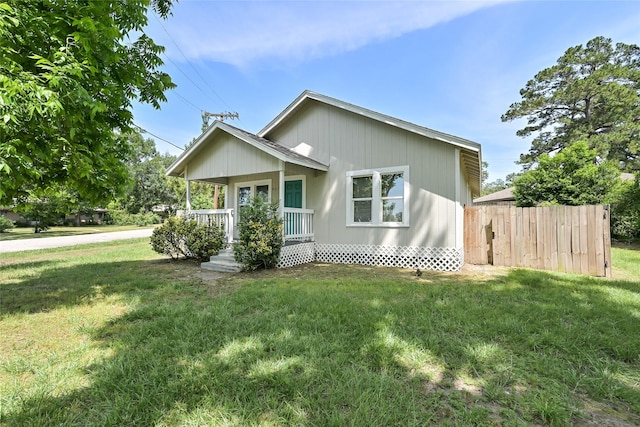 801 S Travis Ave, Cleveland, TX 77327 - view of front of house featuring covered porch