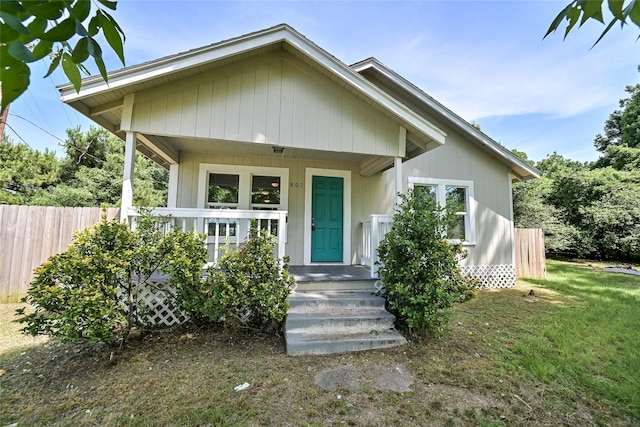 801 S Travis Ave, Cleveland, TX 77327 - bungalow-style house featuring fence and covered porch