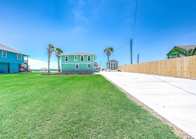 549 Private Road 675, Sargent, TX 77414 - view of yard featuring concrete driveway and stairs