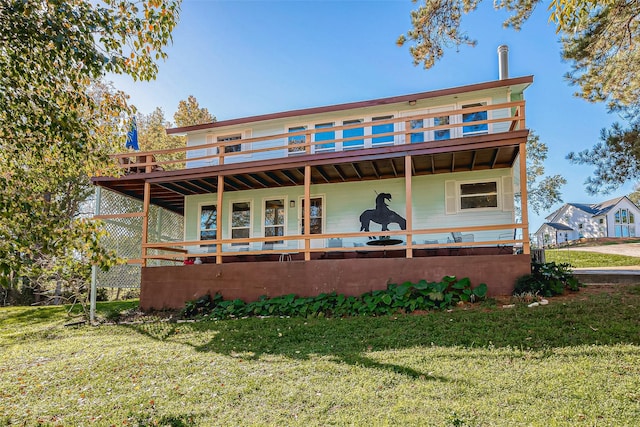 220 Hillcrest Dr, Coldspring, TX 77331 - back of property featuring a yard and a deck