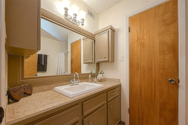 220 Hillcrest Dr, Coldspring, TX 77331 - full bath featuring a textured ceiling and vanity