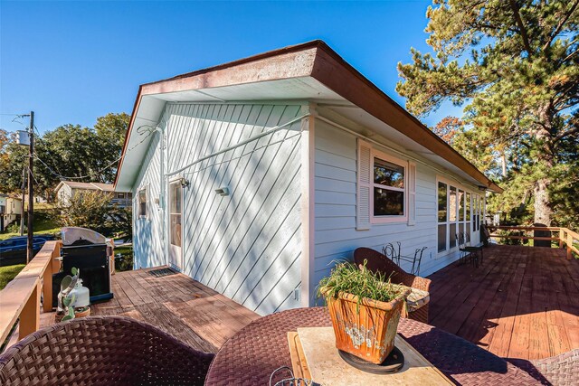220 Hillcrest Dr, Coldspring, TX 77331 - view of side of home featuring a deck