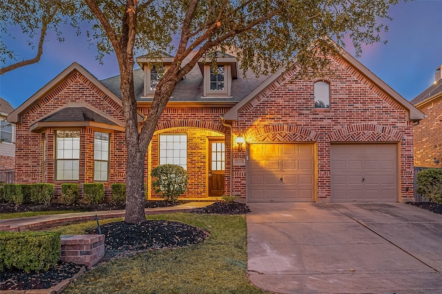 18306 S Austin Shore Dr, Cypress, TX 77433 - view of front of property with brick siding, driveway, a shingled roof, and a garage