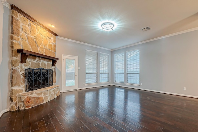 18306 S Austin Shore Dr, Cypress, TX 77433 - unfurnished living room featuring ornamental molding, baseboards, wood finished floors, and a stone fireplace