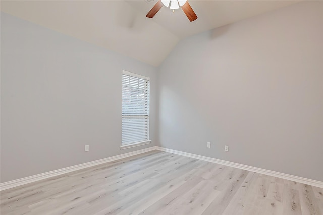 18306 S Austin Shore Dr, Cypress, TX 77433 - unfurnished room with light wood-type flooring, ceiling fan, lofted ceiling, and baseboards