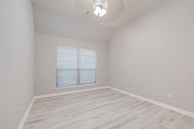 18306 S Austin Shore Dr, Cypress, TX 77433 - empty room featuring ceiling fan, light wood finished floors, baseboards, and lofted ceiling