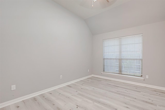 18306 S Austin Shore Dr, Cypress, TX 77433 - spare room featuring a ceiling fan, light wood-style flooring, baseboards, and lofted ceiling