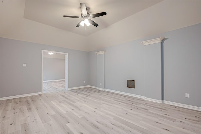 18306 S Austin Shore Dr, Cypress, TX 77433 - empty room featuring a ceiling fan, light wood-style floors, and baseboards